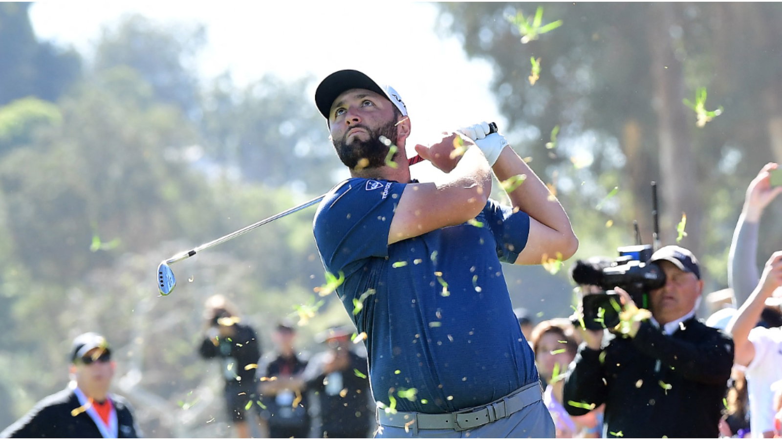 WATCH: Two golf fans FAKE injuries after Jon Rahm tee shot at Riviera
